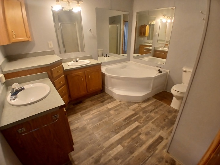 Bathroom with corner soaking tub