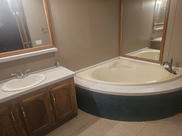 Bathroom with corner tub